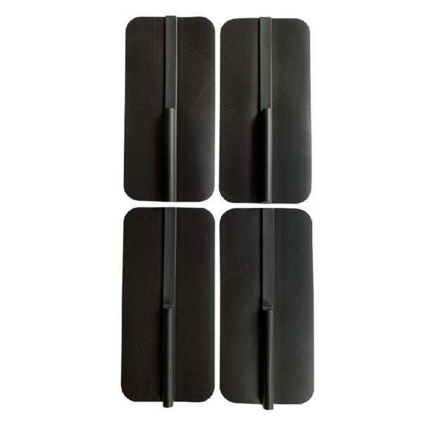 A set of four black plastic stands.
