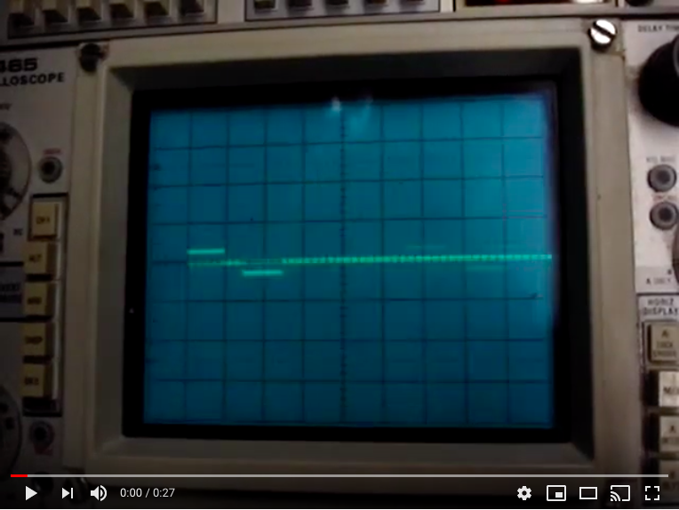 A television screen with a sound wave on it.